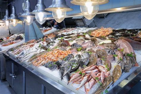 Fresh Raw Variety Of Different Sea Fishes On The Counter At The Fish