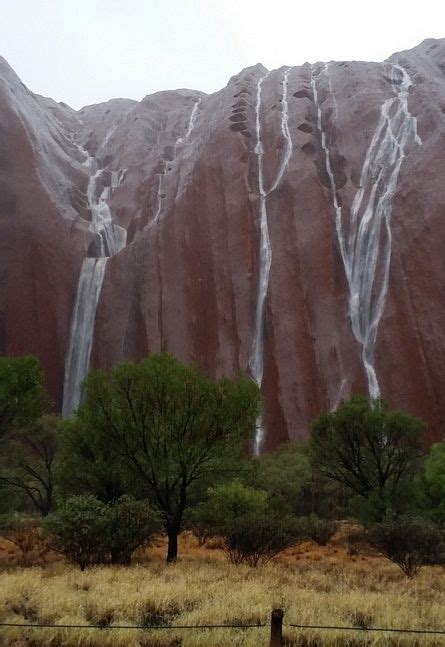 Rain Water Cascading Off Uluru In Uluru Kata Tjuta National Park