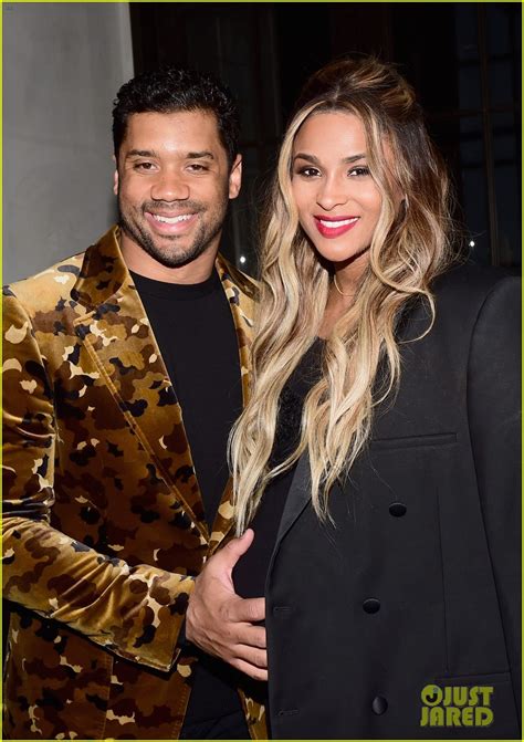 Russell Wilson Holds Pregnant Ciaras Baby Bump At Oscars Party Photo