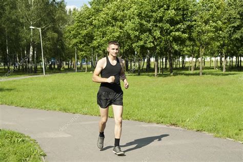 Guy Running In The Park — Stock Photo © Milias1987 13628273