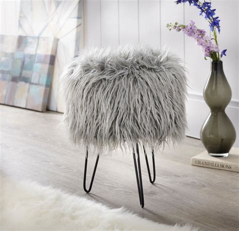 The whale tail design of the butler specialty chalice faux fur ottoman will provide your living room with a unique footrest or extra seat. Bohemian Glam 14" Round Gray Faux Fur Ottoman Footstool ...