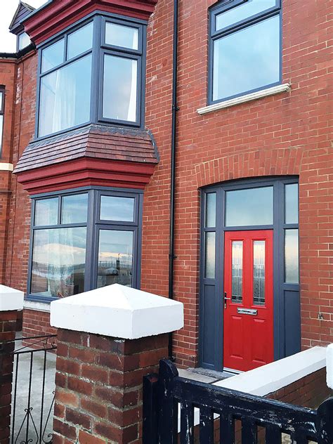 Full House Of Anthracite Grey Windows With Red Composite
