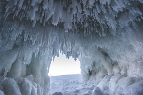Explore Stunning Frozen Ice Caves And Waterfalls During A Pictured