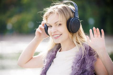 Happy Woman Wearing Headphones Outdoor Stock Photo Image Of Walk