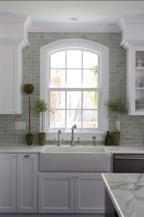 A kitchen backsplash isn't only a functional thing, it's part of decor that will highlight designs and looks. Crackled finish tile backsplash | crackled subway tile ...