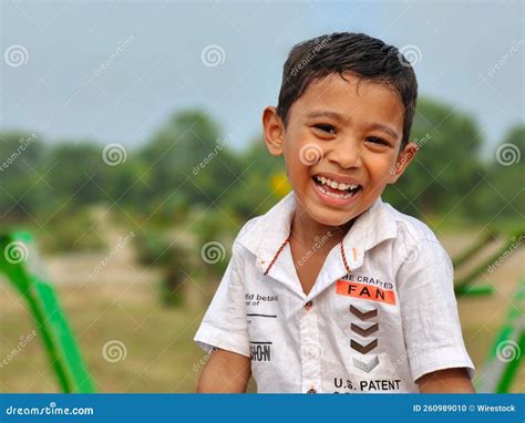 Portrait Of A Young Indian Boy Smiling While Looking At The Camera
