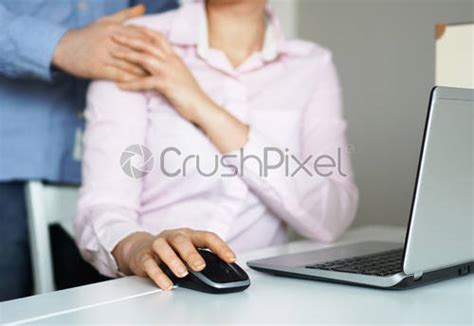 Sexual Harassment At Work Boss Touching His Secretary In Office Stock Photo Crushpixel