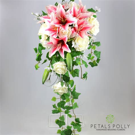 Stargazer Lily And Ivory Rose Brides Shower Bouquet