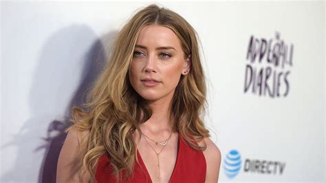 Amber Heard Enjoys A Night Out With Cara Delevingne And Margot Robbie