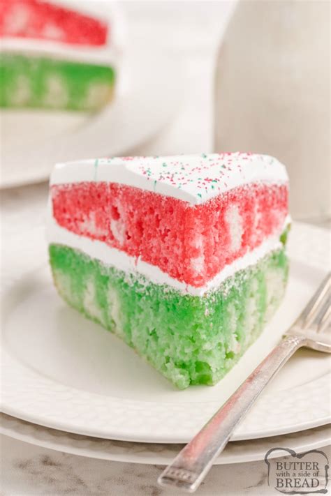 Strawberry gelatin and strawberries liven up each pretty slice of this lovely layered strawberry poke cake that's made from a convenient boxed mix. CHRISTMAS JELLO POKE CAKE - Butter with a Side of Bread