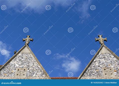 Two Crosses Sit Atop A Church Roof Stock Photo Image Of Architecture