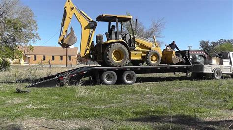 How To Load A Backhoe Youtube