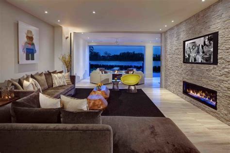 stacked stone fireplaces   warm  modern