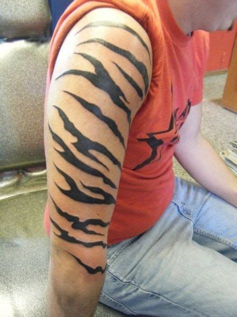 Pin By Bluedrgnfire On Body Art Tiger Stripe Tattoo Stripe Tattoo