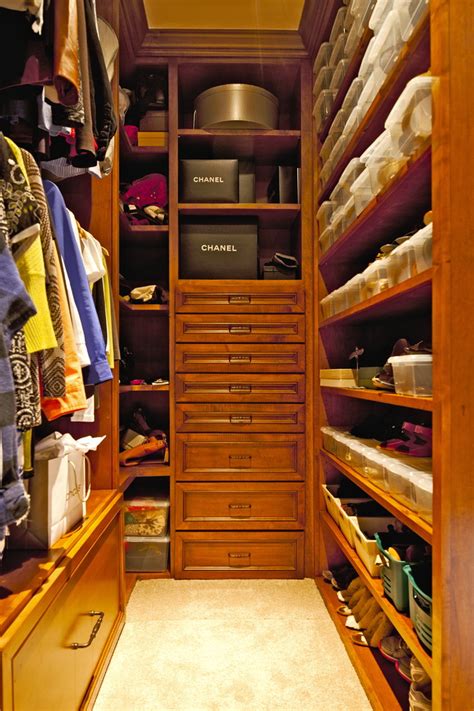These functional and stylish wardrobe options are perfect storage solutions for homes that are short on closet space. JRP Design & Remodel, Inc. - Traditional - Closet - Los ...