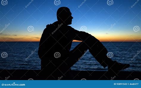 Silhouette Of Calm Thoughtful Man Watching The Sunset Stock Image