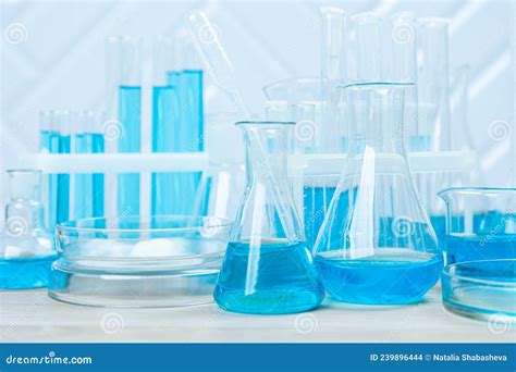 Laboratory Glassware With Blue Liquid In A Test Tube Scientific Laboratory Flasks Droppers