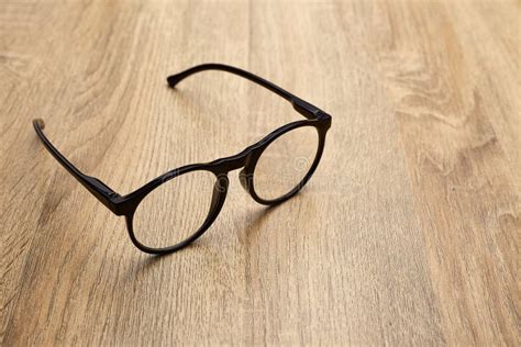 Close Up Of Eyeglasses On Table Stock Image Image Of Desk Material 119895377