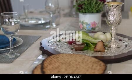 Passover Table Setting With A Traditional Passover Seder Plate With