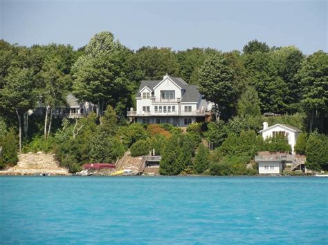 Smith lake bed & breakfast offers 2 luxury suites on the water for your stay in crane hill, alabama. Torch Lake Bed and Breakfast - Hotel Front (With images ...