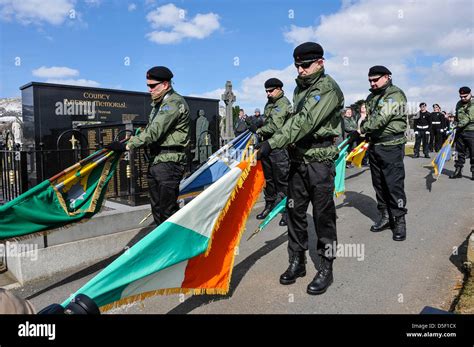 irish republican socialist party irsp members in paramilitary uniforms carry irish republican