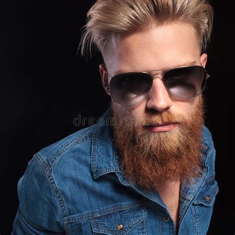 Fashion Man In Blue Shirt Wearing Sunglasses Posing Stock Photo Image