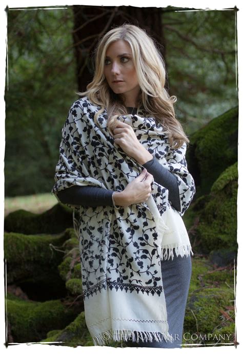 A long, fringed shawl is perfect for draping over your casual outfits, to take them to the next level. How to Wear a Shawl: Essential Tips for the Discerning Woman