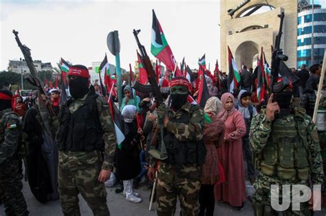 Photo Palestinian Fighters Take Part In A Parade Against Aqaba Summit
