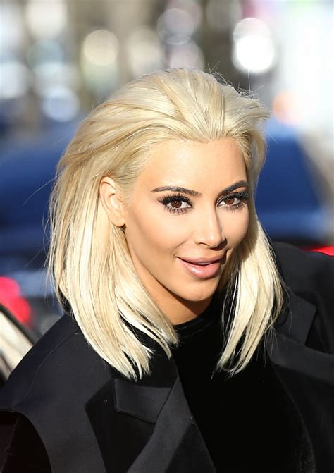 Kim kardashian unveiled her new hairdo at the balmain show as part of paris fashion week. Kim Kardashian Goes Blonde - Out in Paris, March 2015