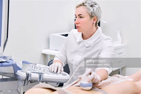 Gynecologist Doing Ultrasound Scan In Modern Clinic High Res Stock