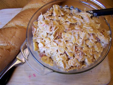 Smothered in a creamy sauce. Diary of a Recipe Addict: Johnny Carino's Bowtie Festival