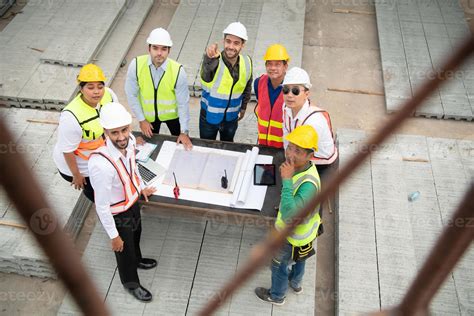 Construction Engineers Architects And Foremen Form A Group