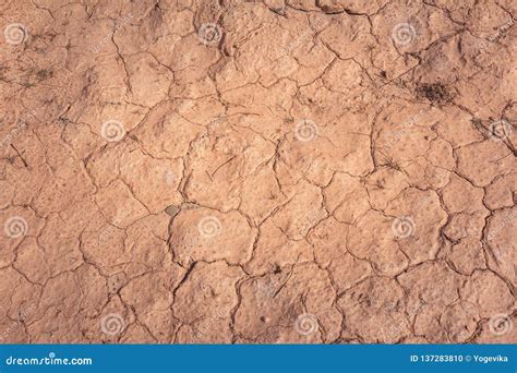 Dry Cracked Desert Soil During Drought Top Down View Stock Photo