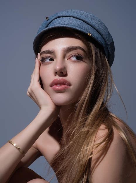 Premium Photo Seductive Woman Face Sensual Young Woman Posing In Fashion Cap Hat Beautiful