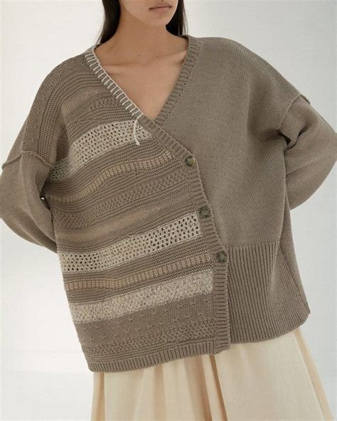 A Cotton Blend Cardigan Crafted With Wide Ribbed Edges And Hand