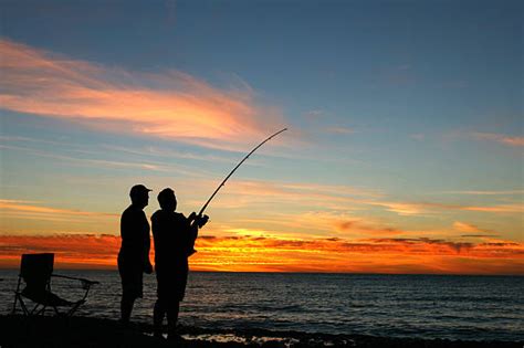 Fishing Sunset Stock Photos Pictures And Royalty Free Images Istock