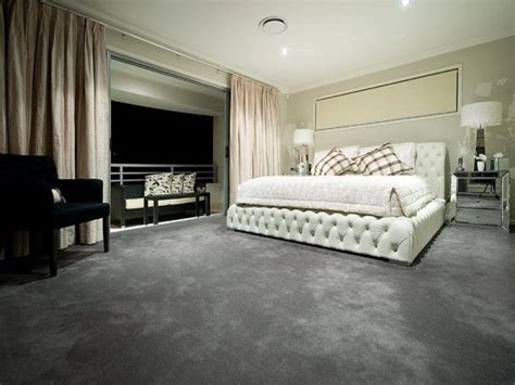 The right carpet will add warmth to your bedroom for years. Modern bedroom design idea with carpet & balcony using ...