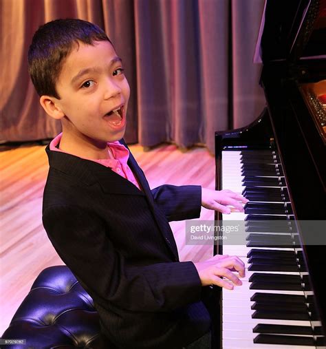 Pianist Ethan Bortnick Poses On Stage At The Grammy Museum At La