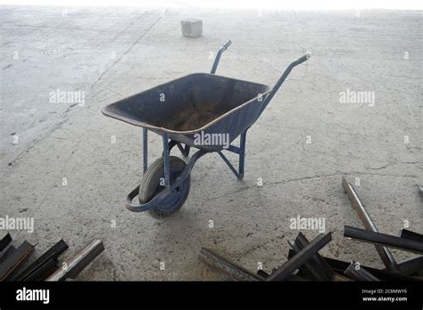 Wheelbarrow In The Workshop Stock Photo Alamy