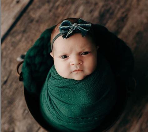 Newborn Baby Gave Out An Adorable Little Grumpy Face For Her Photoshoot