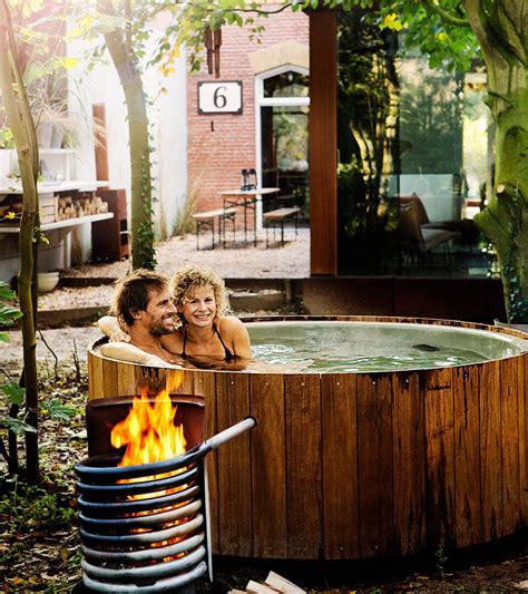 Bathtubs view our entire selection of extra large bathtubs and tubs for two, where bathroom space is plentiful, and comfort won't be sacrificed! Dutchtub Wood | Outdoor bathtub, Outdoor tub, Outdoor