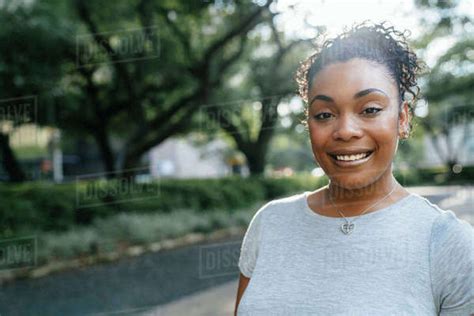 Close Up Portrait Of Smiling Black Woman Stock Photo Dissolve