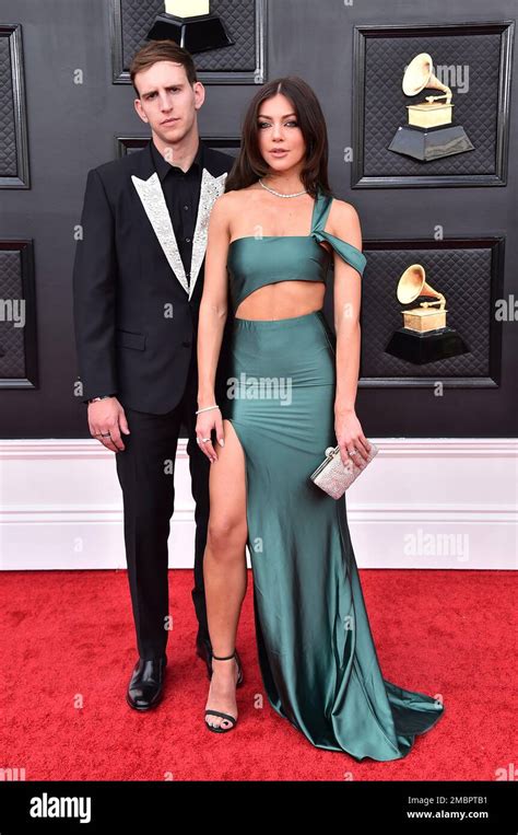 Illenium Left And Lara Mcwhorter Arrive At The 64th Annual Grammy