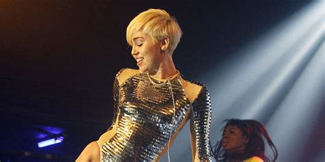 Miley Cyrus Clutches Blow Up Doll During X Rated Nearly Naked