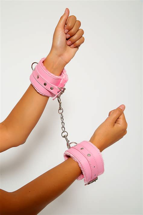 sexy pink faux leather faux fur handcuffs women of edm