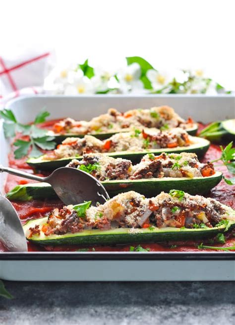 Top with tomato, avocado, cilantro. Easy Stuffed Zucchini Boats - The Seasoned Mom