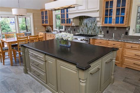 Atlantic Black Brushed Island And Blue Flowers Granite Countertop