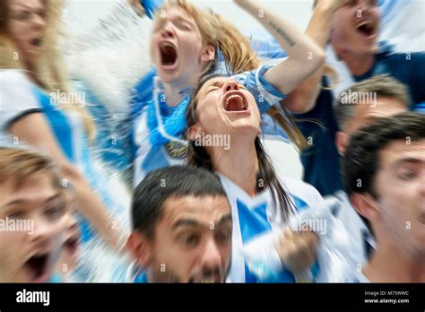 Argentinian Football Fans Shouting While Watching Football Match Stock