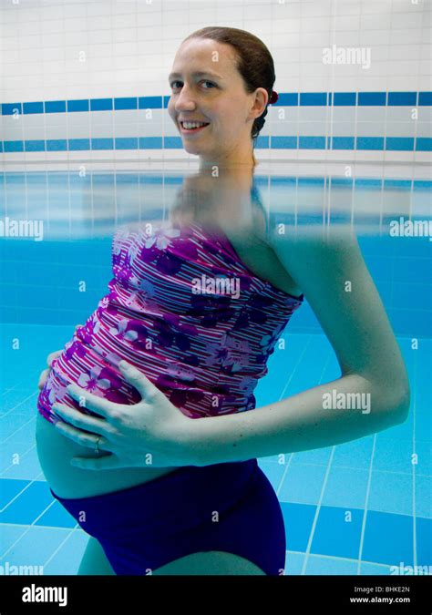 Pregnant Woman Swim Swimming Swims In A Swimming Pool Uk Stock Photo Alamy