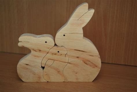 Basteln osterhasen aus holz vorlagen. Wood puzzle Wooden puzzle Wooden rabbit puzzle Rabbits family | Etsy | Wooden rabbit, Wood ...